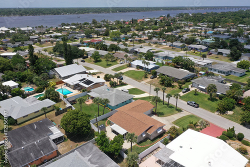 Aerial looking west over Daytona Beach, Florida residential neighborhoods and the Intracoastal Waterway.