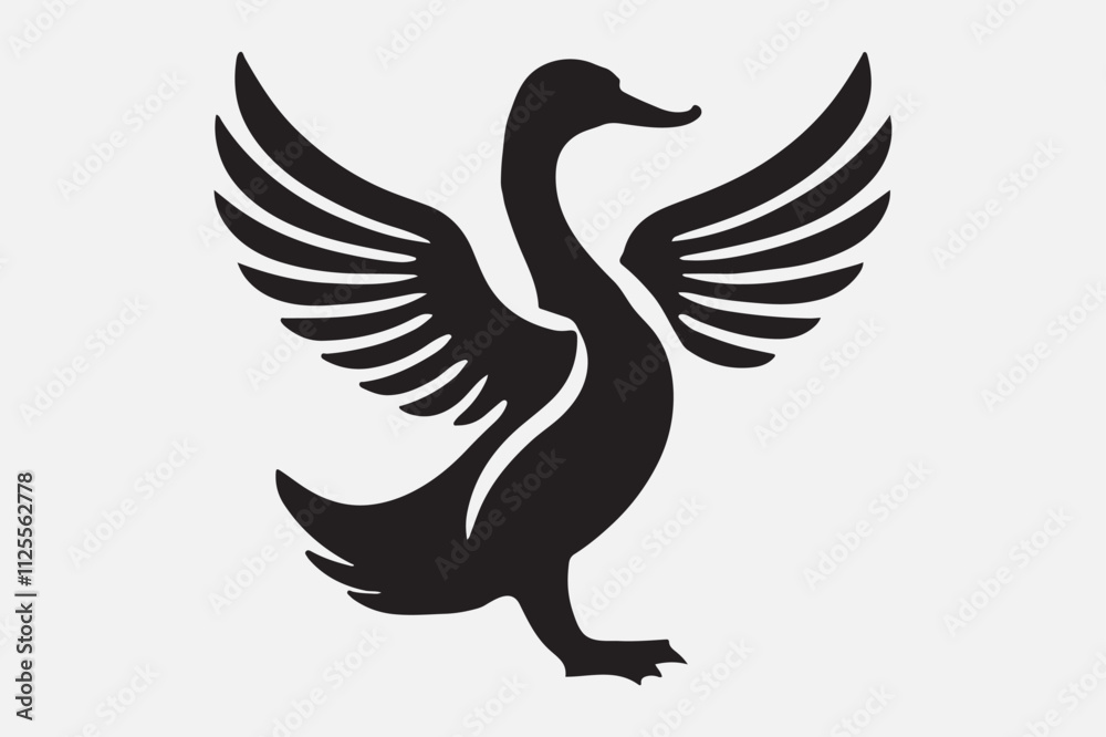 A duck standing upright with its wings spread open. A duck standing upright with its wings spread open.