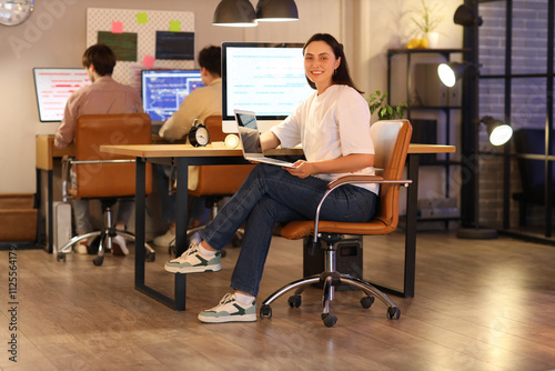 Female programmer with lapt...