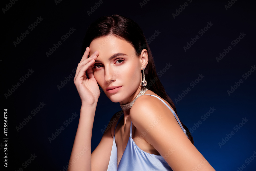 Photo of lady look touch face wear bkue dress isolated dark color background