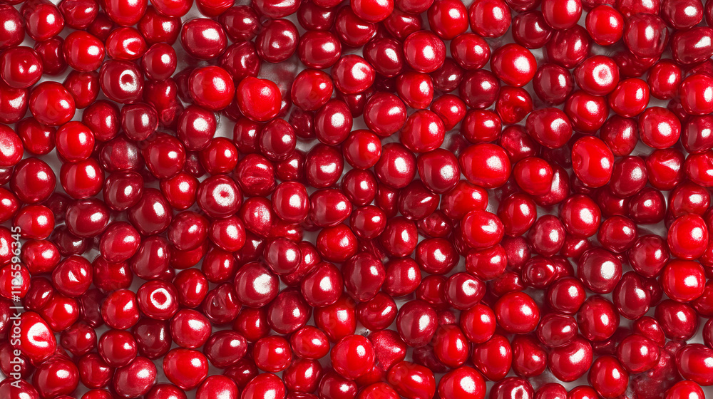 Vibrant red cranberries filling the frame with glossy texture Vibrant red cranberries filling the frame with glossy texture