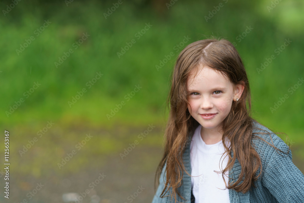Smiling little cute girl walking on outdoor in summer. Concept of active healthy sporty child Smiling little cute girl walking on outdoor in summer. Concept of active healthy sporty child