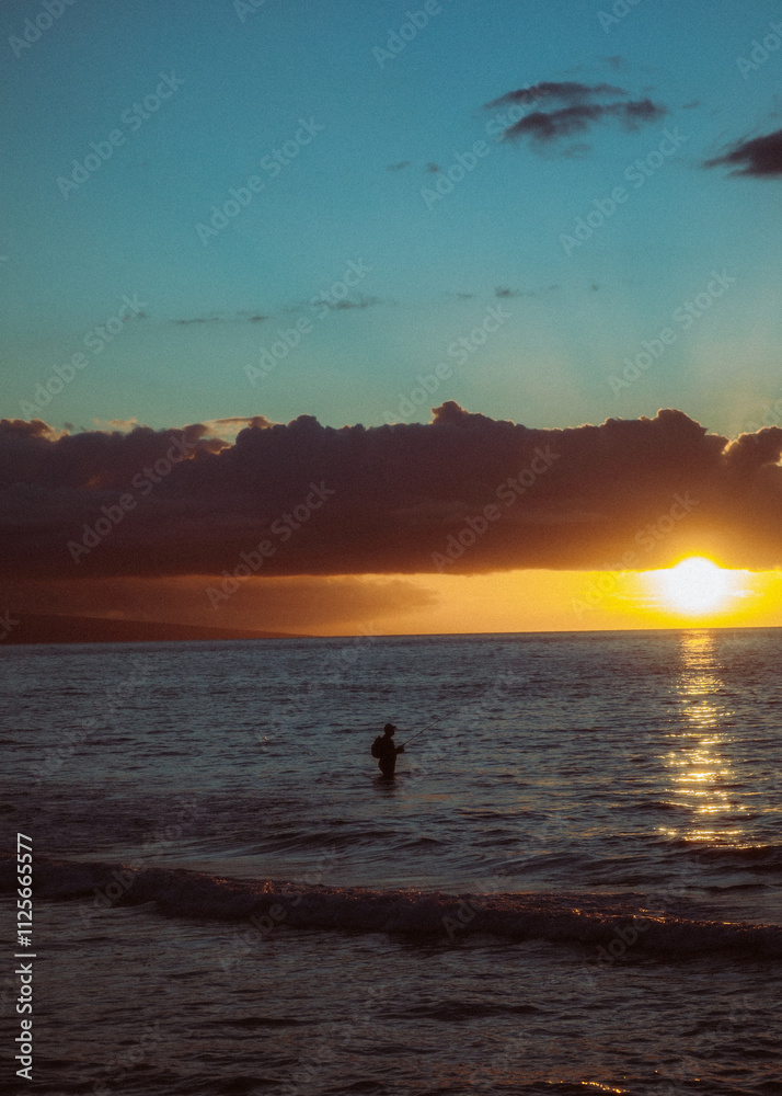 Fototapeta premium Fisherman at Sunset