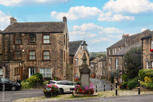 Fotografie The war memorial at the centre of Dobcross village, Saddleworth, Oldham