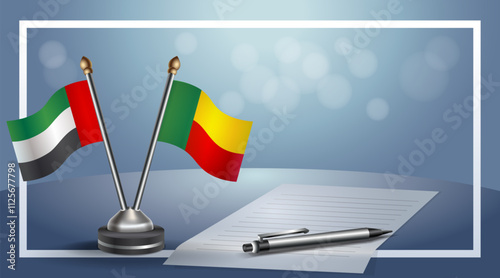 United Arab Emirate and Benin National flags on small table with bokeh background, cooperative relationship