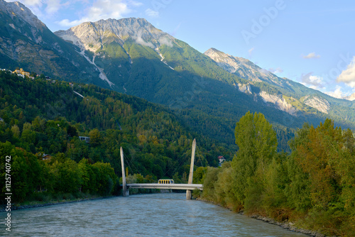 Hungerburg Funicular crossing the Inn River Innsbruck. The Hungerburg Funicular crossing a bridge over the Inn River, Innsbruck, Austria.

