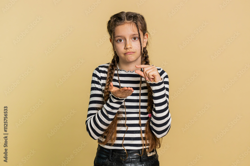 Need some more, please give me. Young preteen child girl kid showing a little bit gesture with sceptic smile showing minimum sign, measuring small size, begging help. Children on beige background Need some more, please give me. Young preteen child girl kid showing a little bit gesture with sceptic smile showing minimum sign, measuring small size, begging help. Children on beige background