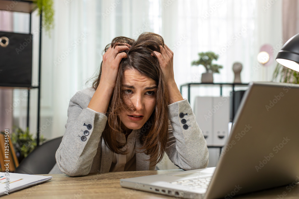 Tired sleepy young businesswoman sitting at home office desk with laptop overworked lazy bored lady worker feel fatigue exhausted of work deprived. Exhausted workaholic freelancer workaholic girl Tired sleepy young businesswoman sitting at home office desk with laptop overworked lazy bored lady worker feel fatigue exhausted of work deprived. Exhausted workaholic freelancer workaholic girl