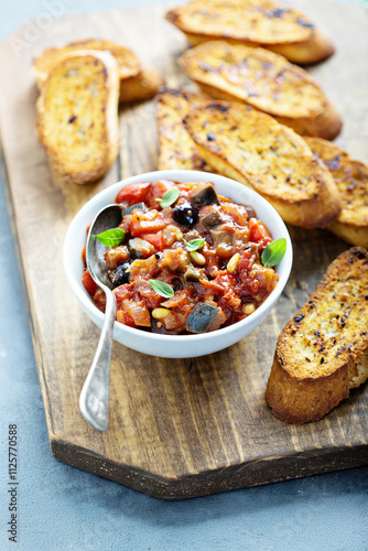 Eggplant caponata with garlic bread photo