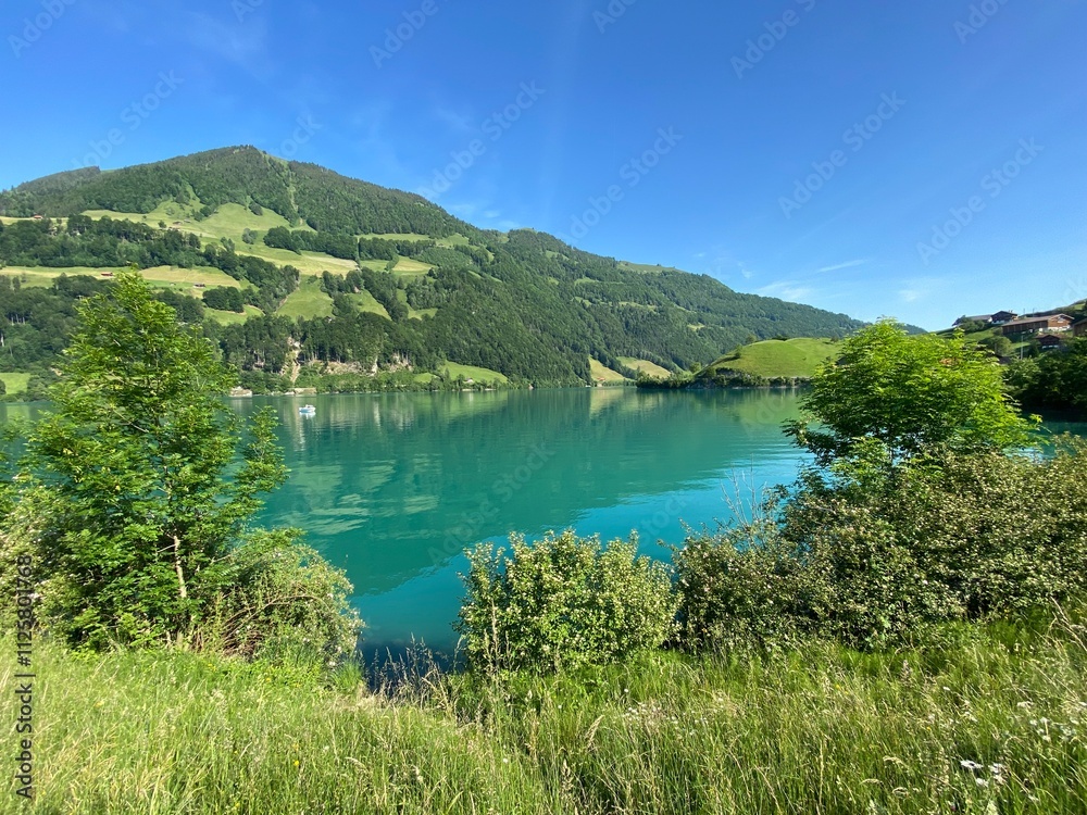 Lake Lungern or Natural reservoir Lungerersee - Canton of Obwald, Switzerland (Naturstausee Lungernsee oder Lungerensee - Kanton Obwald, Schweiz) Lake Lungern or Natural reservoir Lungerersee - Canton of Obwald, Switzerland (Naturstausee Lungernsee oder Lungerensee - Kanton Obwald, Schweiz)