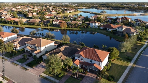 Fototapeta Naklejka Na Ścianę i Meble -  backyard lakes behind single-family homes in Lakewood Ranch, Florida