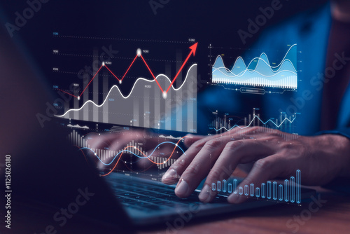 Businessman use AI analyzing data on laptop with futuristic graphs and charts, financial growth trends and analytics. Data analytics automated with AI technology. Dashboard report KPI insights.