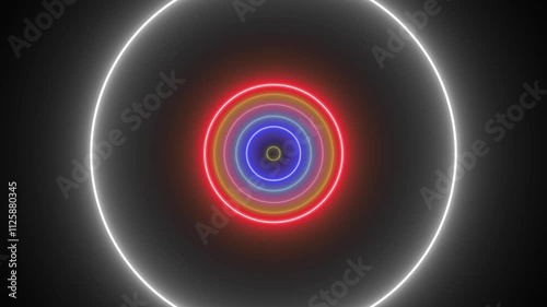 Seamless futuristic abstract background with neon effect.  Circles of various colors that grow and shrink with neon effects and a black background.