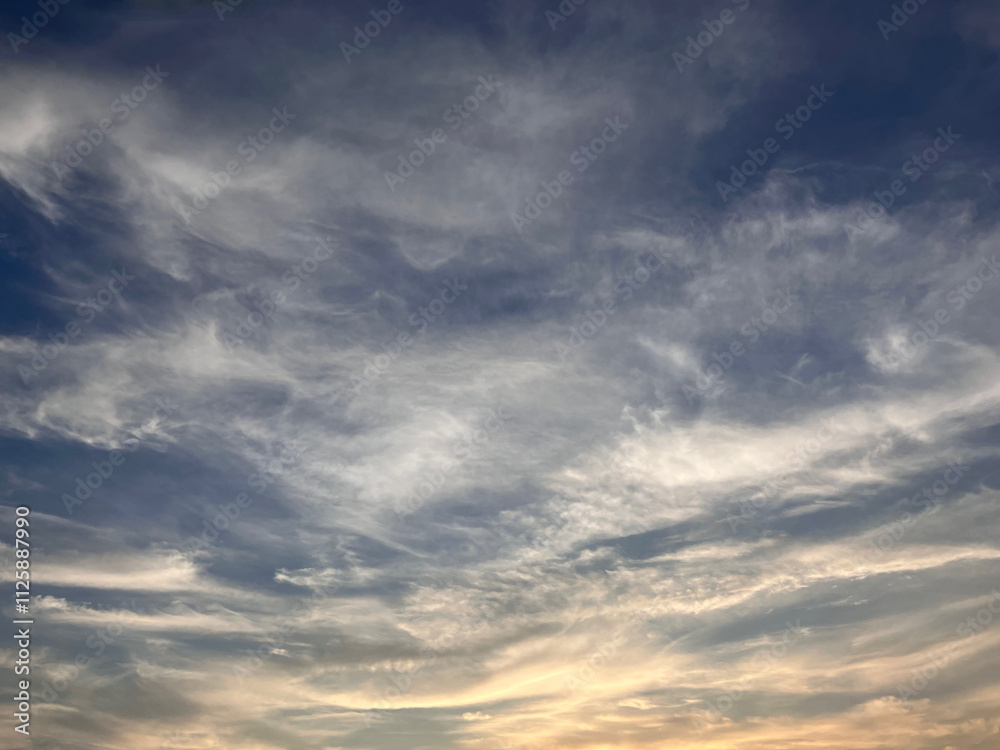 Textured Evening Sky: Layered Cloud Patterns with Subtle Sunset Colors on West Lake in Hanoi, Vietnam Textured Evening Sky: Layered Cloud Patterns with Subtle Sunset Colors on West Lake in Hanoi, Vietnam