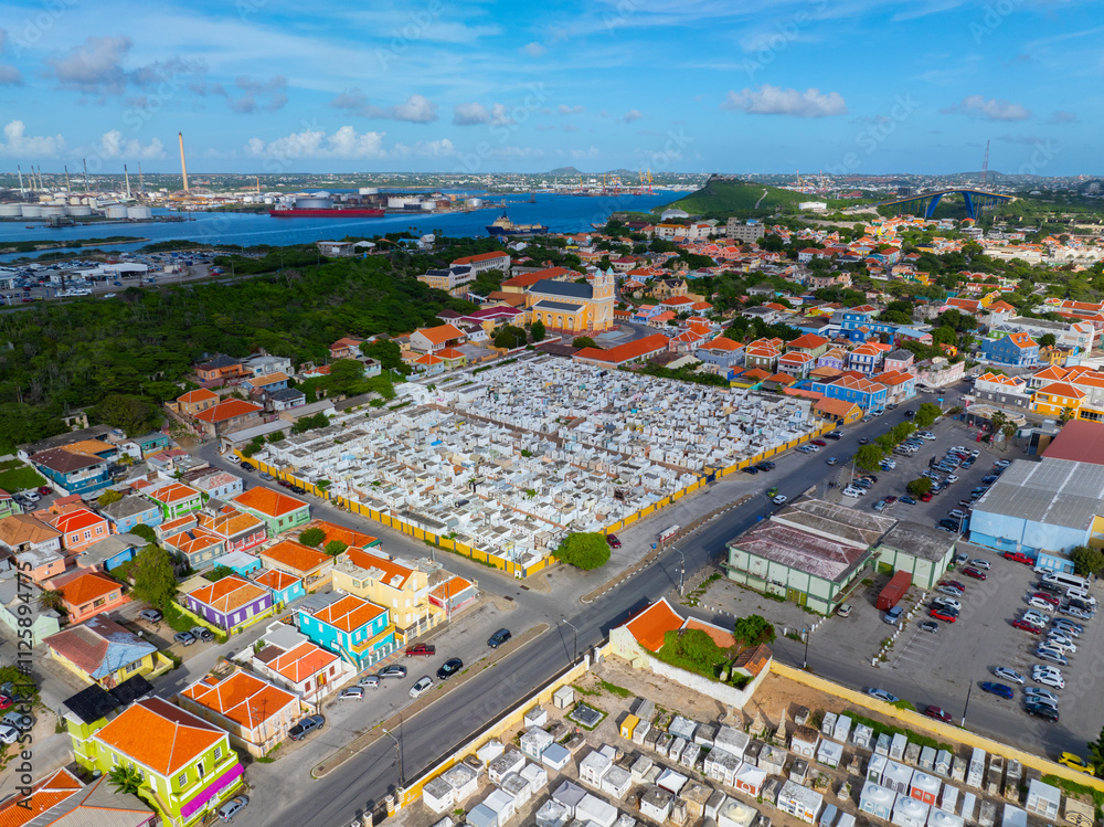 Fototapeta premium Santa Famia church and cemetery aerial view at Otrobanda center in city of Willemstad, Curacao. Historic Willemstad is a UNESCO World Heritage Site. 