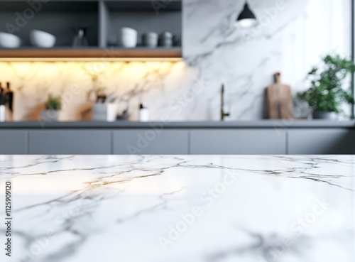 Modern kitchen marble countertop with blurred background.