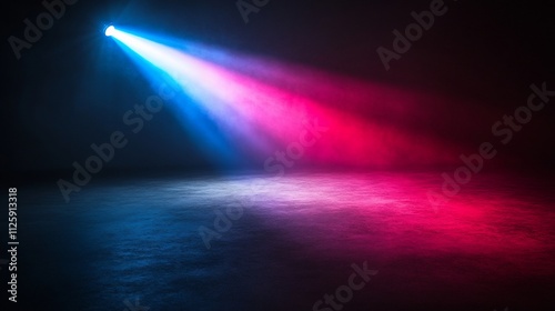 Blue and red light beam on dark smoky floor.