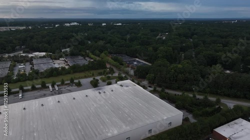 Drone shot of North Atlanta business district and neighborhood with greenery, Doraville, USA photo