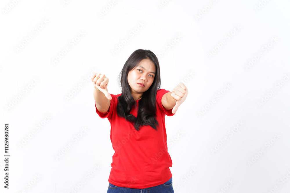 Showing Thumb Down, Dislike Concept Of Beautiful Asian Woman Wearing Red Shirt Isolated On White Background Showing Thumb Down, Dislike Concept Of Beautiful Asian Woman Wearing Red Shirt Isolated On White Background