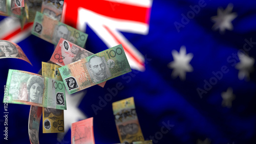 Falling Australian Currency Notes Against the Australian Flag, Representing Economic Volatility and the Potential for Financial Instability in the Australian Market. photo