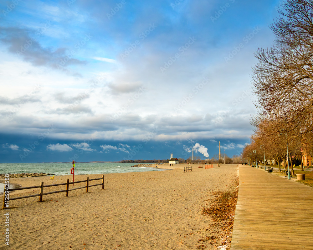 Fototapeta premium Kew Beach and the boardwalk in Toronto on a bright December morning room for text
