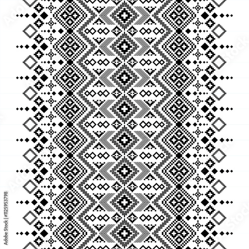 A striking black and white geometric pattern inspired by traditional ethnic art. The design features a repeating motif of triangles and squares, creating a bold and graphic look. 