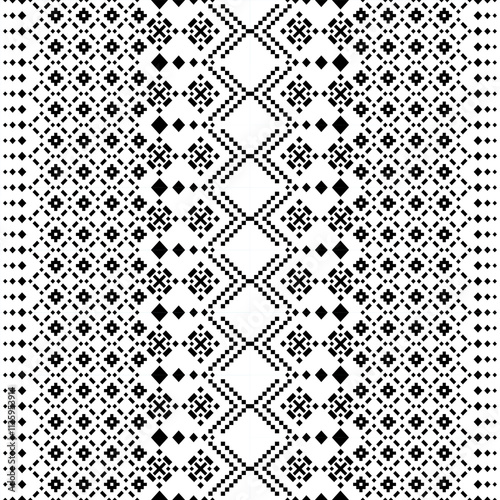 A striking black and white geometric pattern inspired by traditional ethnic art. The design features a repeating motif of diamonds, squares, and crosses, creating a bold and graphic look. 