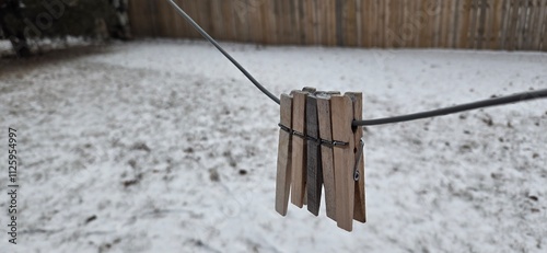 cloth pins on a cloth line in winter