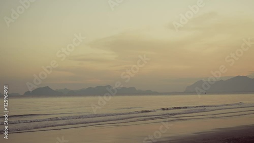 Sunset beach and green hill and sea for summer concept at Prachuap Khiri Khan Thailand.