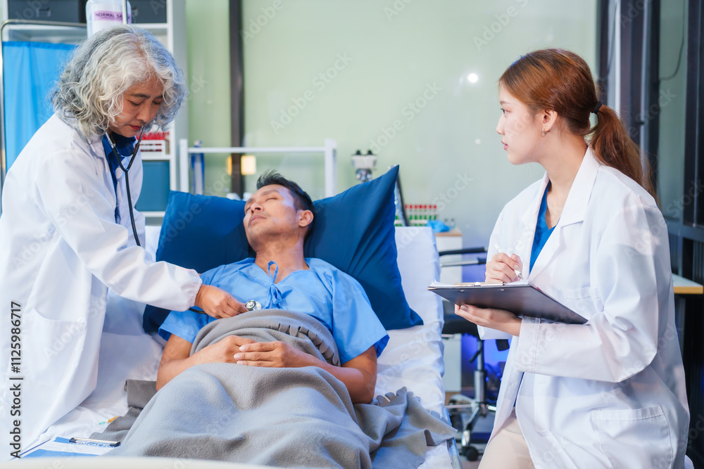 Two female doctors examine a patient lying on a hospital bed,discuss the medical chart,administer medicine,and provide encouragement, ensuring compassionate care and fostering the patient's recovery Two female doctors examine a patient lying on a hospital bed,discuss the medical chart,administer medicine,and provide encouragement, ensuring compassionate care and fostering the patient's recovery