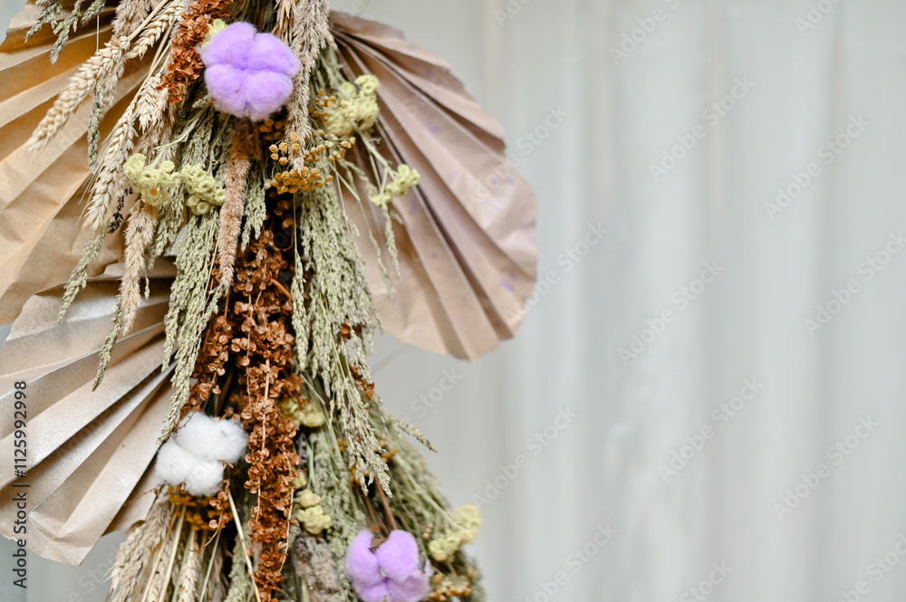 decoration made of dried flowers and paper. copy space decoration made of dried flowers and paper. copy space