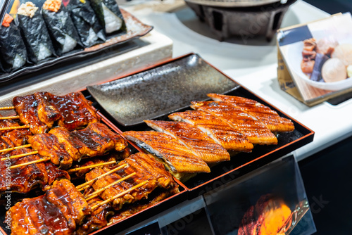 Grilled eel at seafood market in Osaka Japan. photo