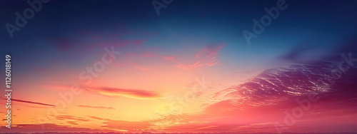 A breathtaking sunset painting the sky in vibrant hues of pink, orange, and deep blue, creating a serene and tranquil atmosphere.