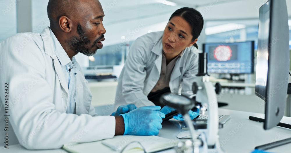 Science, people or tablet in lab for discussion, brainstorming or innovation for medicine development. Scientists, research team or tech at desk for learning, mentorship or virus vaccine engineering Science, people or tablet in lab for discussion, brainstorming or innovation for medicine development. Scientists, research team or tech at desk for learning, mentorship or virus vaccine engineering