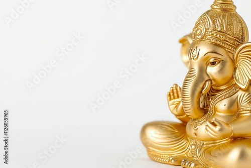 Golden ganesha statue on white background photo