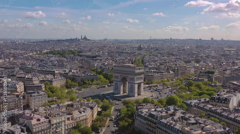 PARIS, FRANCE - OCTOBER 3, 2024: Aerial view of Arc de Triomphe and cityscape showcasing Paris landmarks and bustling streets