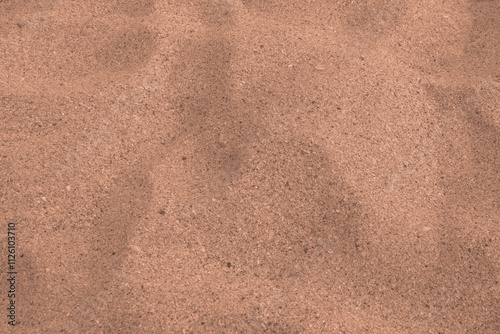 Mocha mousse color 2025 sandy beach texture background