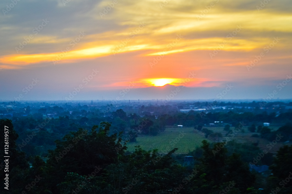 Sunset Over Mountain and Countryside Landscape view in Evening at Lamphun, Northern Thailand Sunset Over Mountain and Countryside Landscape view in Evening at Lamphun, Northern Thailand
