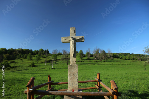 Old roadside shrine in former, abandoned village - Nieznajowa in Low Beskid mountain range, Poland photo