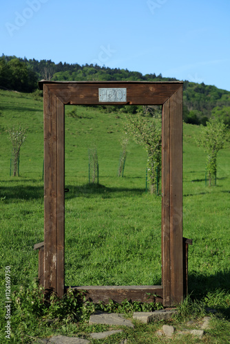 Obraz na płótnie Symbolic door in former, abandoned village - Nieznajowa in Low Beskid mountain range, Poland w salonie