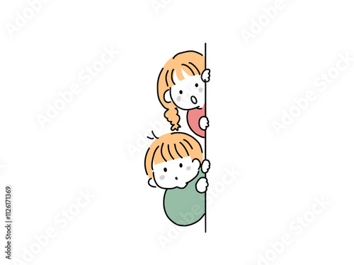壁から覗いている子ども