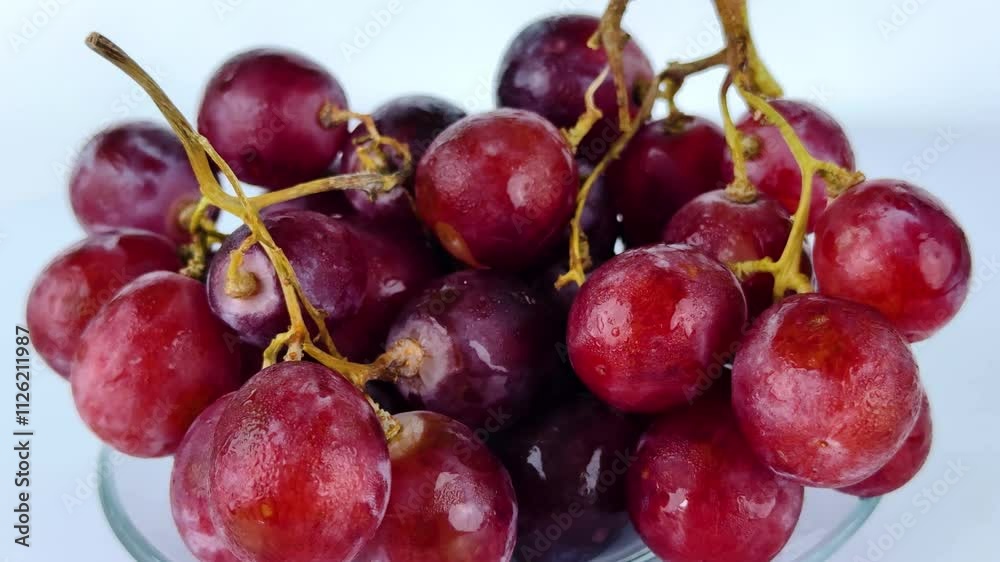 Fresh Grapes Rotates Slowly on White Background Fresh Grapes Rotates Slowly on White Background