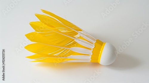 A single, bright yellow shuttlecock with white feathers, centered on a white background