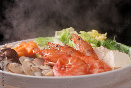 Steaming seafood pot photo