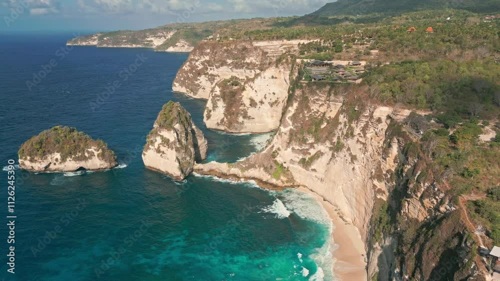 Seafront Cliffs Of Diamond Beach In Nusa Penida, Bali Indonesia. Aerial Drone Shot Seafront Cliffs Of Diamond Beach In Nusa Penida, Bali Indonesia. Aerial Drone Shot