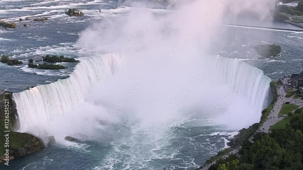 Stunning aerial view of Horseshoe Falls, iconic section of Niagara Falls, capturing the powerful cascade of water and mist, this breathtaking view highlights nature beauty, Canada Stunning aerial view of Horseshoe Falls, iconic section of Niagara Falls, capturing the powerful cascade of water and mist, this breathtaking view highlights nature beauty, Canada