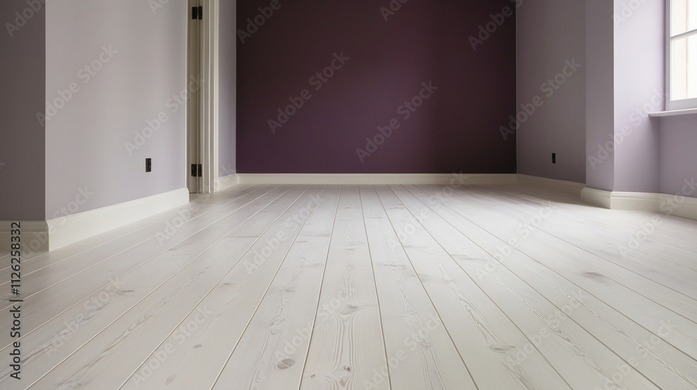Empty room with whitewashed wood flooring and newly painted purple wall in background Empty room with whitewashed wood flooring and newly painted purple wall in background