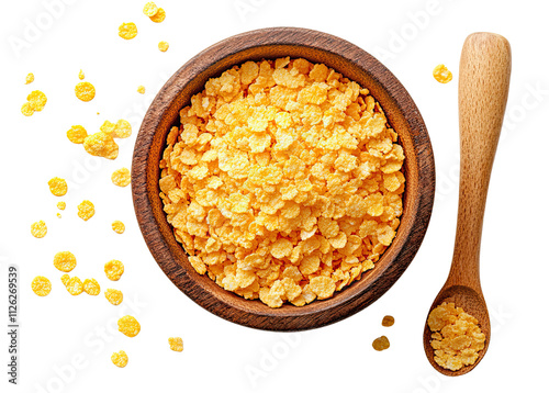 Top view of yellow split peas in a wooden bowl with a spoon.