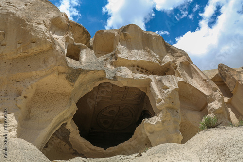 Cappadocia is a semi-desert region in central Turkey. It is famous for its fairy chimneys - tall cone-shaped rock formations, which are especially numerous in Pasabag Monks Valley and Goreme Valley. photo