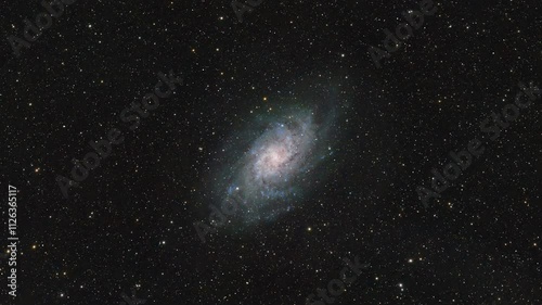 Cosmic Travel. An Interstellar Journey through the Depths of Space. Animation of a real astronomical photograph of the Triangulum Galaxy M33 captured by me. High quality 4k footage